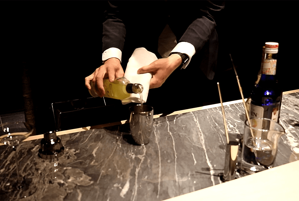 Bartender serving cocktails