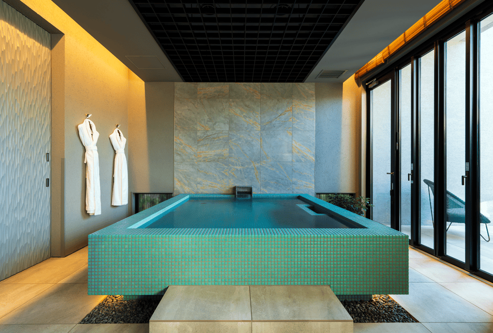 A large, high-quality tile bath with a spectacular view