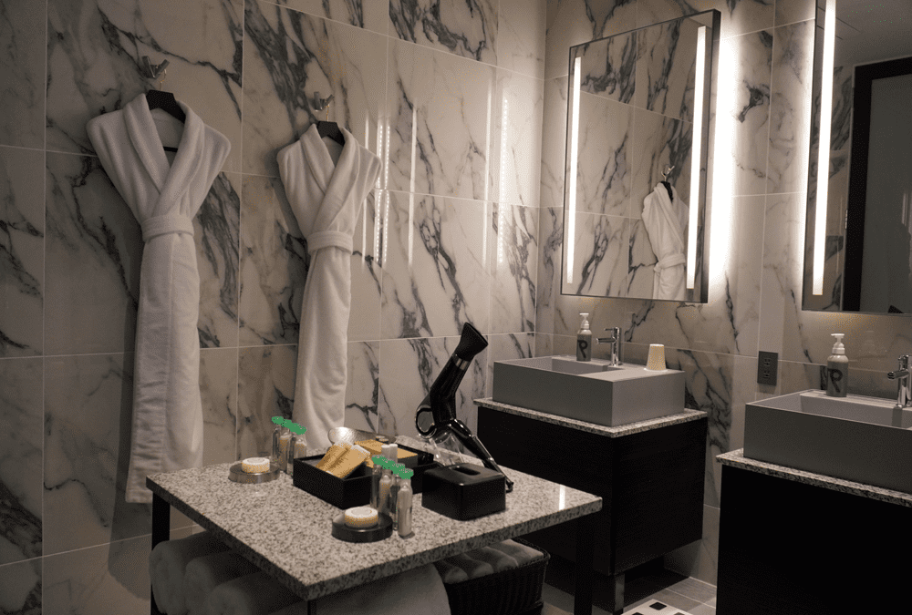 bathroom with marble walls